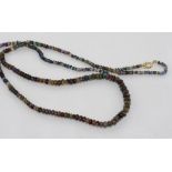 Black opal necklace with 9ct yellow gold clasp size: approx 56cm length