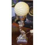 Art Deco chrome electric Lady lamp with round cream coloured glass shade, 38cm high approx
