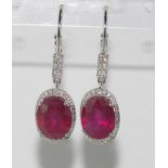 18ct white gold, ruby and diamond earrings rubies = 7.73cts, diamonds = 0.18cts, weight: approx 4.85