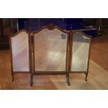 Early 20th century walnut fireplace screen with bevelled mirrors and fold out side panels, 110cm