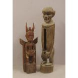 Two Timorese carved timber figures 63cm high (tallest)