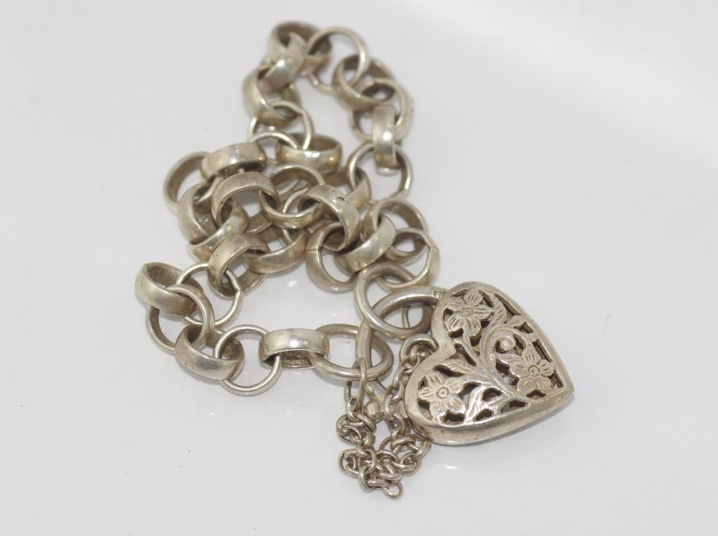 Silver bracelet with heart lock