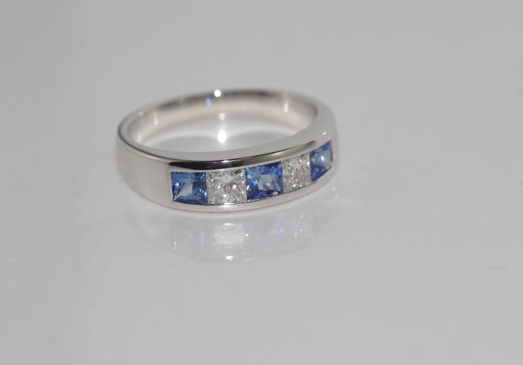 18ct white gold inline sapphire & diamond ring set with 3 princess cut Ceylon sapphire = 0.78ct, 2