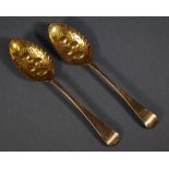 Pair early HM sterling silver berry spoons possibly William & Mary (marks rubbed). Fruit decorated