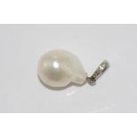 South sea baroque pearl pendant with 9ct white gold enhancer set with 3 light pink diamonds