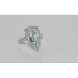 18ct white gold, aquamarine and diamond ring pear shaped aquamarine = 4.25ct, diamonds = 46