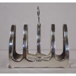 George VI HM sterling silver toast rack Sheffield, 1940, makers EV. L7.5cms approx. W53 grams.