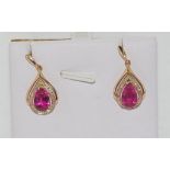 18ct rose gold, pink tourmaline & diamond earrings comprising 2 tourmalines (total =2.63ct approx,