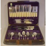 Cased art deco silver plate cutlery set for eight with bone handled knives and carving set, Empire