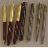 Sterling silver Parker pen set together with a second Parker pen set with rolled gold caps and a