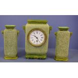 Antique French clock garniture 8 day time only, comprising clock in a green glaze naturalistic