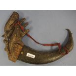 Tibetan carved horn container with figural head to front, 38cm wide