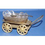 Vintage gilt metal novelty wagon salt cellar with cut glass insert and silver plated spoon, W14.