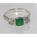 18ct white gold Columbian emerald and diamond ring set with Columbian emerald=0.72ct, 2 diamonds=0.