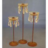 Set of 3 graduated metal candlesticks with crystal surrounds and drops, 41 cm high (tallest)