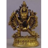 Tibetan gilt metal figure of Vajrabhairava figure in yab-yum with wife, H21cm approx