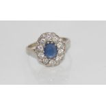 18ct gold, natural Burmese sapphire & diamond ring White gold cluster ring with untreated 1.05ct