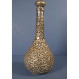 Chinese silver cased glass decanter encased peony blossom decoration. Collar of decanter dented &