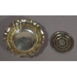 Two silver dishes comprising of a German 800 silver 12cm diameter and a smaller hallmarked London