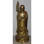 Tibetan brass Buddha holding a Sceptre in right hand and ball in left hand, H43cm approx