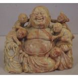 Tibetan carved soapstone laughing Buddha figure surrounded by five children, W18cm approx