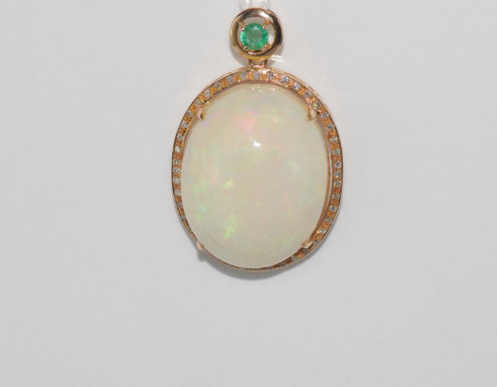 18ct rose gold, oval opal and diamond pendant with tsavorite garnet. Comprising of opal approx 26ct,