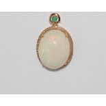 18ct rose gold, oval opal and diamond pendant with tsavorite garnet. Comprising of opal approx 26ct,