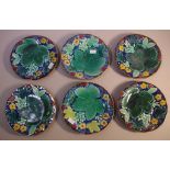 Six polychrome Majolica biscuit plates