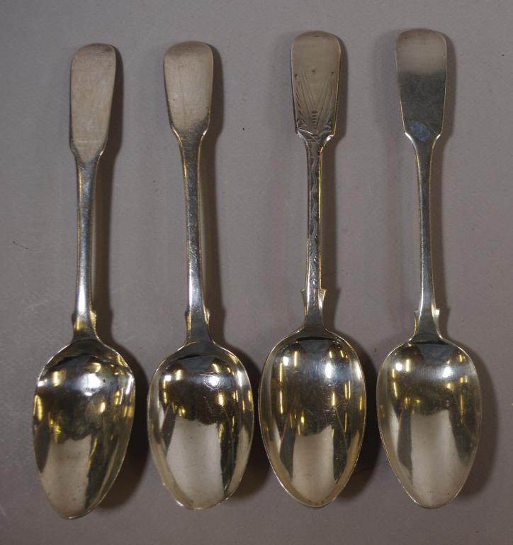 Four various antique sterling silver tablespoons