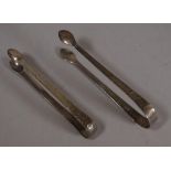 Two George III sterling sugar tongs