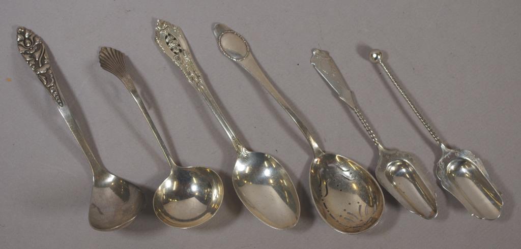 Six various silver serving spoons