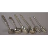 Six various silver serving spoons