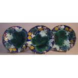 Three polychrome Majolica side plates