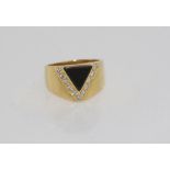 18ct yellow gold, onyx and diamond ring