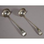 Pair of crested sterling silver sauce ladles