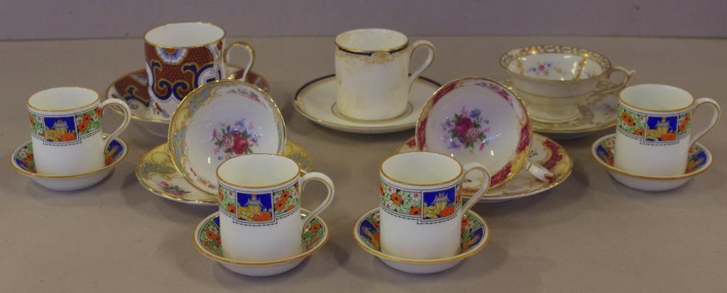 Four art deco Royal Doulton coffee cups & saucers