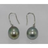 Pair of silver, black pearl and diamond earrings