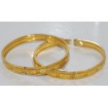 Two antique 22ct yellow gold bangles