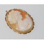 Large cameo pendant/brooch with gold surround