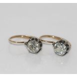 Pair of antique diamond set silver earrings