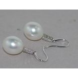 18ct white gold pearl and diamond earrings