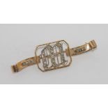 Victorian gold and diamond M bar brooch