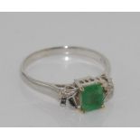 18ct white gold, emerald and diamond ring