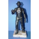 Bronze figure of a miner