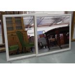 Pair of white framed mirrors