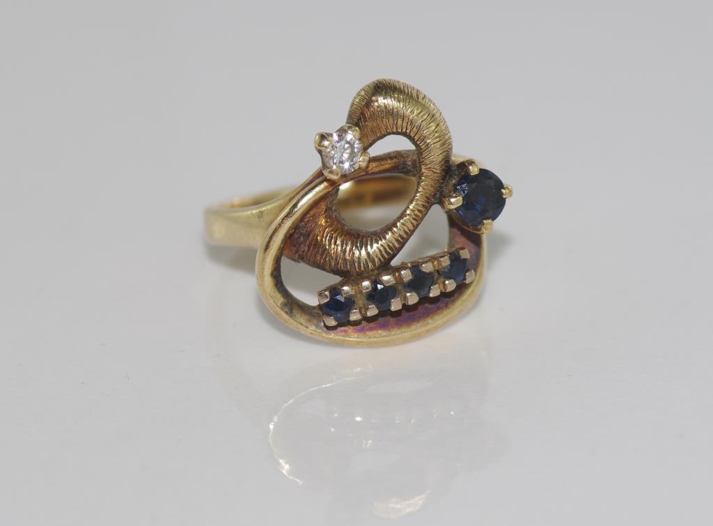 Unusual 9ct yellow gold, sapphire and diamond ring