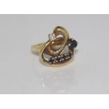 Unusual 9ct yellow gold, sapphire and diamond ring