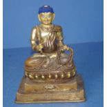 Tibetan brass deity figure