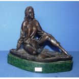 Bronze figure of seated woman