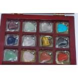 Boxed set of semi-precious stone heart pendants